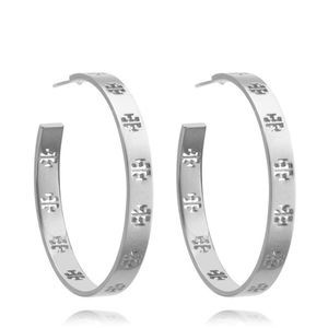 Tory Burch Silver Cut-out Logo Hoop Earrings with Dust Bag
